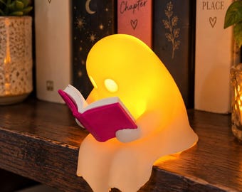 Cute little ghost sitting on shelf reading a book with flickering tea light, book lover gift, cosy home ornament, gift idea, handmade