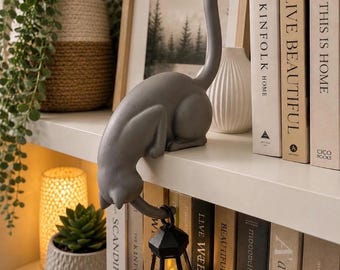 Grey Cat shelf ornament holding hanging lantern. Book or cat lover gift. Cosy home decor, unique 3d printed cute lamp.