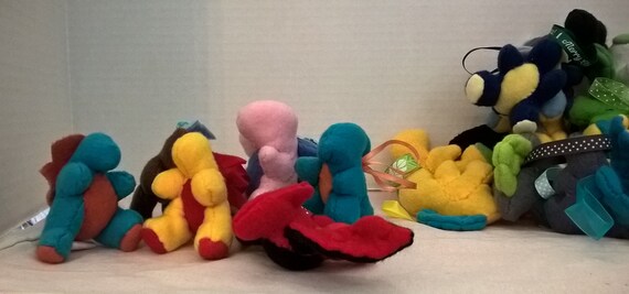 tiny dino plush