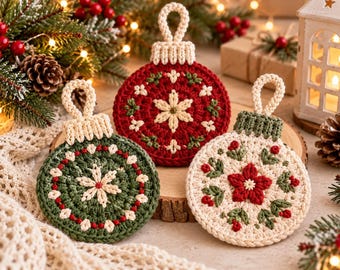 May include: Three round, flat, crocheted Christmas ornaments with hanging loops. One is dark green with a cream snowflake, one is red with a cream snowflake, and one is cream with a red flower and green leaves. Each has a ribbed top.