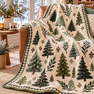 May include: A cream-colored crochet blanket featuring a repeating pattern of dark green and olive pine trees, small sprigs, and star-like accents. The blanket has a decorative border with a textured bobble stitch edge in green and white.