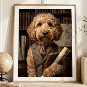 May include: A framed portrait of a golden-brown curly-haired dog wearing a brown tweed waistcoat and a matching patterned necktie. The dog is holding a thick leather-bound book and a rolled-up vintage map against a background of a library bookshelf.