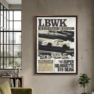 May include: A framed wall poster featuring a white and yellow race car with the number 23. The text includes LBWK, Liberty Walk, and Super Silhouette S15 Silvia. The design displays a large action shot of the car on a track above three smaller images of the vehicle from different angles.