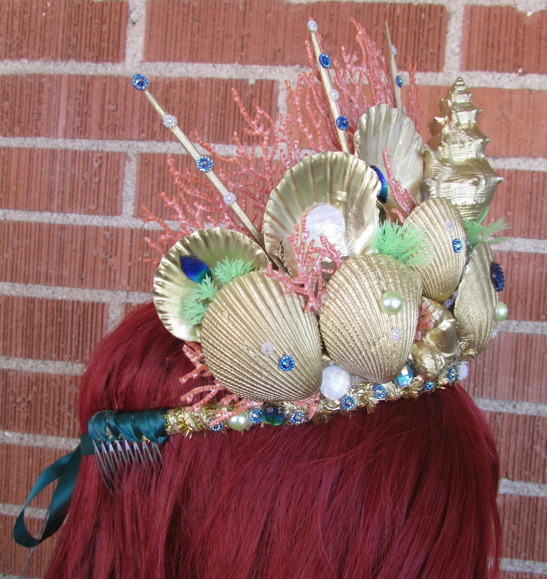 Mermaid headdress shells, gold, red hair, pearls on Craiyon