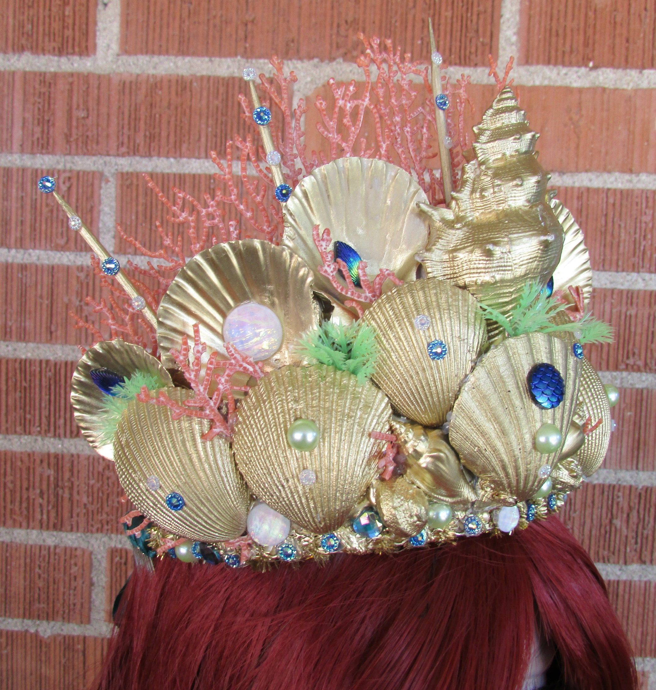 Mermaid headdress shells, gold, red hair, pearls on Craiyon