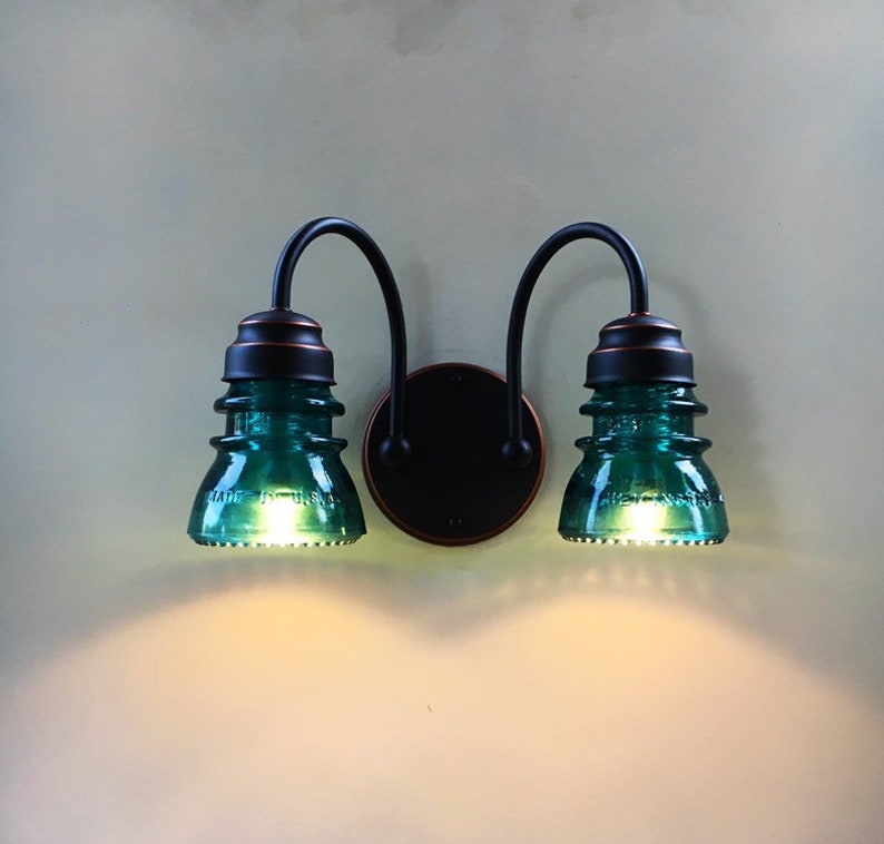 Beautiful 2 Light Oil Rubbed Bronze Fixture With Arching Stems And Choice Of Vintage Glass Insulators Also Available In Other Finishes