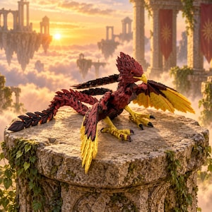 May include: A mythical bird figurine with deep red, layered plumage and bright yellow wing tips. The creature features a sharp yellow beak, dark eyes, and yellow talons, with a long, segmented tail extending behind its body on a stone pillar.