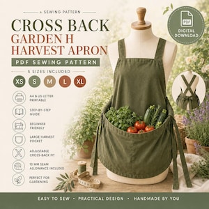 May include: A dark olive green cross-back harvest apron with a large front pocket filled with fresh herbs, tomatoes, and zucchini. The apron is displayed on a mannequin, featuring adjustable straps and a practical design for gardening tasks.