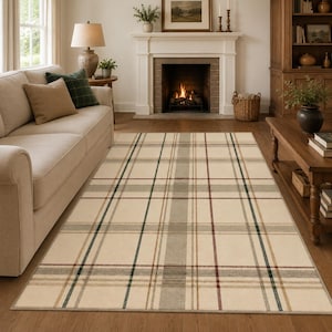 Può includere: Un tappeto rettangolare con una base color crema e un motivo a quadri su larga scala. Il design è composto da linee orizzontali e verticali che si intersecano in tonalità verde scuro, rosso intenso e grigio tenue, creando un motivo a griglia.