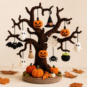 May include: A dark brown crocheted tree with a round base, decorated with hanging ornaments including orange jack-o'-lanterns, white ghosts, a black witch hat, a black bat, a spider, a broom, a cauldron, and a white spiderweb.
