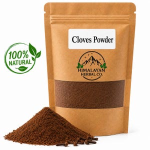 May include: A brown kraft paper pouch containing dark brown cloves powder with a clear window. The label reads Cloves Powder and features a Himalayan Herbal Co. logo with a mountain graphic. A 100% Natural green leaf emblem is visible.