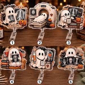 May include: Six acrylic badge reels featuring ghost characters in radiology-themed settings. Designs include ghosts with X-rays, CT scanners, medical books, and pumpkins. Each piece has a clear plastic clip and displays text like RAD LIFE and X-RAY VIBES.