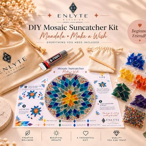 May include: A DIY mosaic suncatcher kit featuring a gold satin drawstring bag, a tube of B-7000 glue, a gold chain, a wooden applicator, and multiple small plastic bags containing colorful glass tiles and beads for a mandala design.