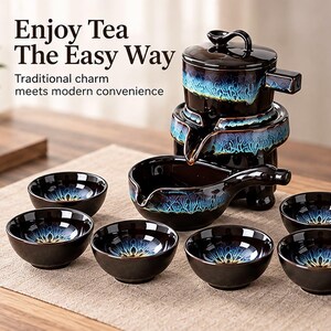 May include: A ceramic tea set featuring a dark brown glaze with a vibrant blue and white crystalline drip pattern. The set includes a stacked teapot with a side handle, a pouring pitcher, and six small tea cups. Text reads: Enjoy Tea The Easy Way.