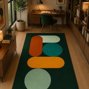 Designer inspired green abstract carpet with bold multicolour geometric shapes and modern styling