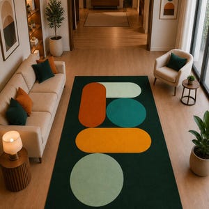 Modern green living room rug with abstract orange yellow and mint geometric pattern