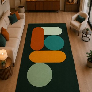 Modern geometric area rug with deep green background and colourful orange yellow mint and ivory shapes