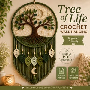 May include: A circular crochet wall hanging featuring a brown tree with green leaves, a cream crescent moon, and small stars. Below the hoop, green yarn fringe hangs with wooden beads and crochet leaf and moon charms. Text reads Tree of Life.