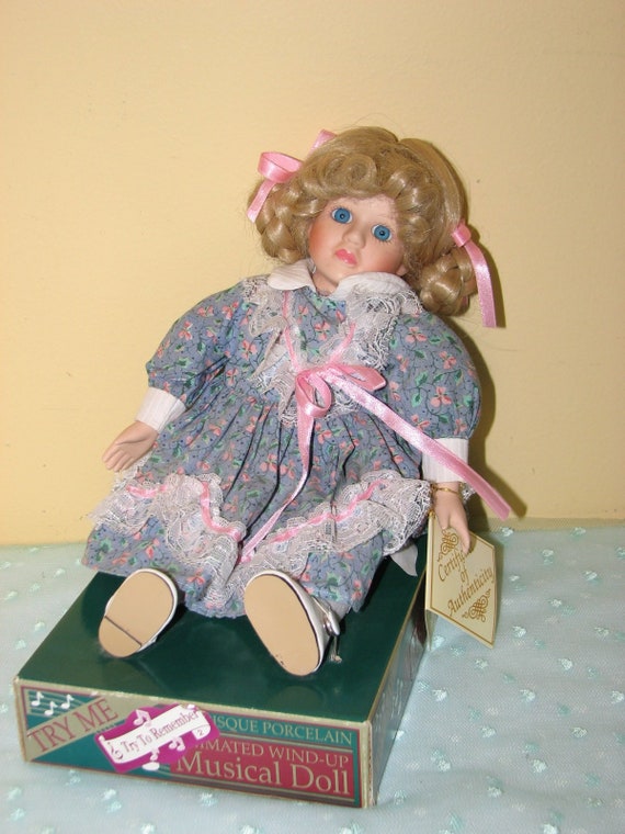 vintage wind up musical dolls