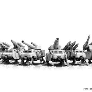 May include: A collection of six grey, unpainted miniature military vehicles with mechanical legs. Each vehicle features distinct weapon systems, including cannons, missile launchers, and anti-aircraft guns. The text READY TO PRINT and THE MAKERS CULT is visible.