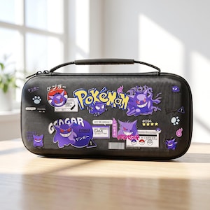 May include: A black rectangular carrying case featuring a variety of purple Gengar character stickers and the yellow Pokemon logo. The case includes a top handle, zip closure, and multiple graphic decals including Japanese text and game-themed icons.