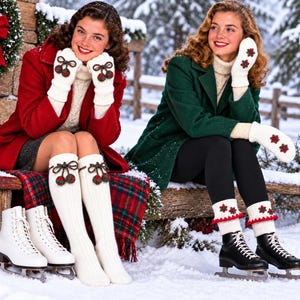 May include: Two pairs of winter accessories: one set features cream-coloured knit mittens and knee-high socks with dark green and red cherry-shaped pom-poms, while the other set includes cream-coloured mittens and leg warmers with red and green floral accents.