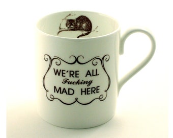 Cheshire Cat Were All Fucking Mad Here Mug, Alice in Wonderland Mug, Cat Quote, Bone China Mug, Funny Swear Mug, Alice Gift, Fun Gift Ideas