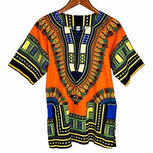 May include: A short-sleeved shirt featuring a vibrant orange base with intricate geometric and floral patterns in black, yellow, blue, and white. The garment has a V-neckline with a central panel design and a repeating border print along the hem.