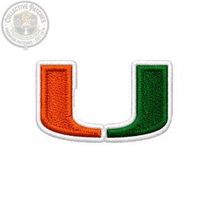 May include: An embroidered patch in the shape of the letter U, featuring a split design with a bright orange left side and a dark green right side, all outlined with a thick white border. The patch has a textured, stitched surface finish.