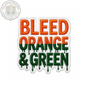May include: An embroidered patch featuring the text BLEED ORANGE & GREEN. The word BLEED is in orange, while ORANGE & GREEN features a split color effect with orange on top and green on the bottom, with a dripping paint effect on the letters.