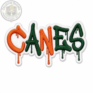 May include: An embroidered patch featuring the word CANES in a graffiti-style font. The letters C and N are orange, while A, E, and S are dark green. Each letter has a dripping effect, and the entire design is outlined in white thread.
