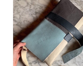 Soft Knoll leather clutch white and aquamarine