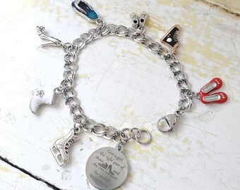 May include: A silver charm bracelet featuring various shoe charms, including high heels, sneakers, and ice skates. A round charm with the quote "Give a girl the right pair of shoes and she can conquer the world!" is also included.