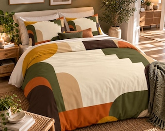 May include: A bedding set featuring a duvet cover and two pillowcases with a geometric pattern in shades of cream, olive green, dark brown, and burnt orange. The design includes large, rounded arch shapes and blocky, stepped color segments.