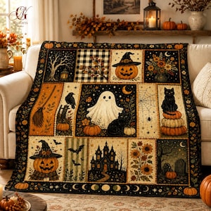 May include: A rectangular throw blanket featuring a patchwork design with Halloween-themed illustrations including jack-o'-lanterns, a ghost, a black cat, a haunted house, sunflowers, a broomstick, a raven, and a spiderweb on a dark background.