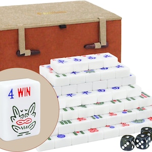 May include: A Mahjong set featuring white tiles with blue, green, and red characters, stacked in a pyramid formation. A circular inset shows a single tile with the text 4 WIN and a green graphic. Includes a brown storage case and three black dice.