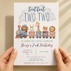 Op de afbeelding: Een verjaardagsuitnodigingskaart met een aquareltrein met een beer, konijn, giraf, vos en leeuw in wagons. De tekst luidt: toot toot TWO TWO, ALL ABOARD FOR A JOYFUL CELEBRATION, Henry's 2nd Birthday, zaterdag 26 april 2026 om 16:00 uur.