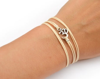 Om bracelet for women, wrapped string bracelet with silver tone Ohm charm, Hindu symbol, Yoga spiritual jewelry, gift for her, mantra