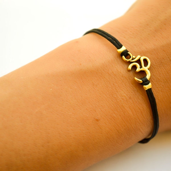 Om bracelet, adjustable bracelet, gold tone Ohm charm, Hindu mantra, black cord, gift for her, yoga bracelet, lucky charm, chakra jewelry