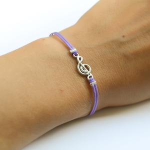 Treble clef bracelet, purple cord bracelet with a silver G Clef charm, music jewelry, musical note, music gift idea, silver treble clef