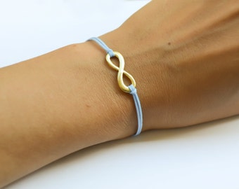 Bracelet infini, bracelet cordon bleu avec un charme sans fin doré, bracelet Yoga, cadeau pour elle, bijoux minimalistes, amitié, zen