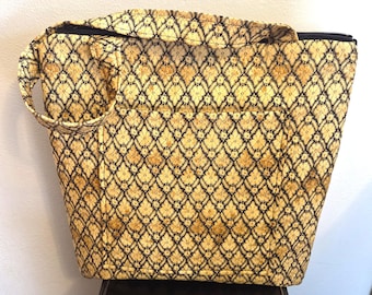 May include: A yellow and black patterned tote bag with a zip closure and a large front pocket.