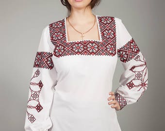 Women white vyshyvanka. Traditional Ukrainian women's blouse. Ethnic sorochka shirt. Ukrainian clothes. Embroidered blouse cross-stitch