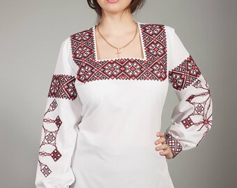 Women white vyshyvanka. Traditional Ukrainian women's blouse. Ethnic sorochka shirt. Ukrainian clothes. Embroidered blouse cross-stitch