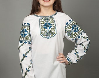 Ukrainian embroidery Vyshyvanka. Traditional women's blouse Ethnic sorochka shirt. Ukrainian clothes. Embroidered blouse cross-stitch