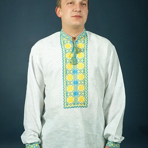 Ukrainian vyshyvanka. Traditional embroidered shirt men. Blue and yellow embroidery. Embroidery stitch on linen ウクライナ刺繍 Ukrainian clothes