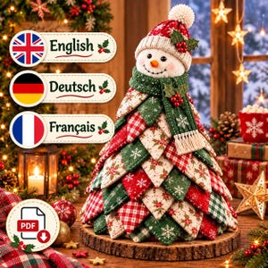 May include: A fabric Christmas tree decoration featuring a snowman topper with a red and white knit hat. The tree is constructed from layered, quilted fabric triangles in red, green, and white patterns, accented with holly berries and snowflakes.
