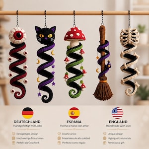 May include: Five hanging crochet ornaments featuring a red eyeball, a black cat head, a red and white mushroom, a brown broomstick, and a beige ribcage. Each ornament has a spiral tail decorated with small charms like eyes, stars, moons, or mushrooms.
