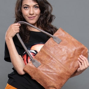 braune Ledertasche, weiche Ledertasche, einfache Ledertasche, Alltagstasche aus Leder, mittelgroße Ledertasche, lässige Schultertasche