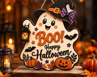 May include: A wooden Halloween wall sign shaped like a ghost wearing a black witch hat with a purple polka dot bow. The sign features the text "Boo! Happy Halloween," orange pumpkins, black bats, and colorful autumn leaves, hanging by a rope.